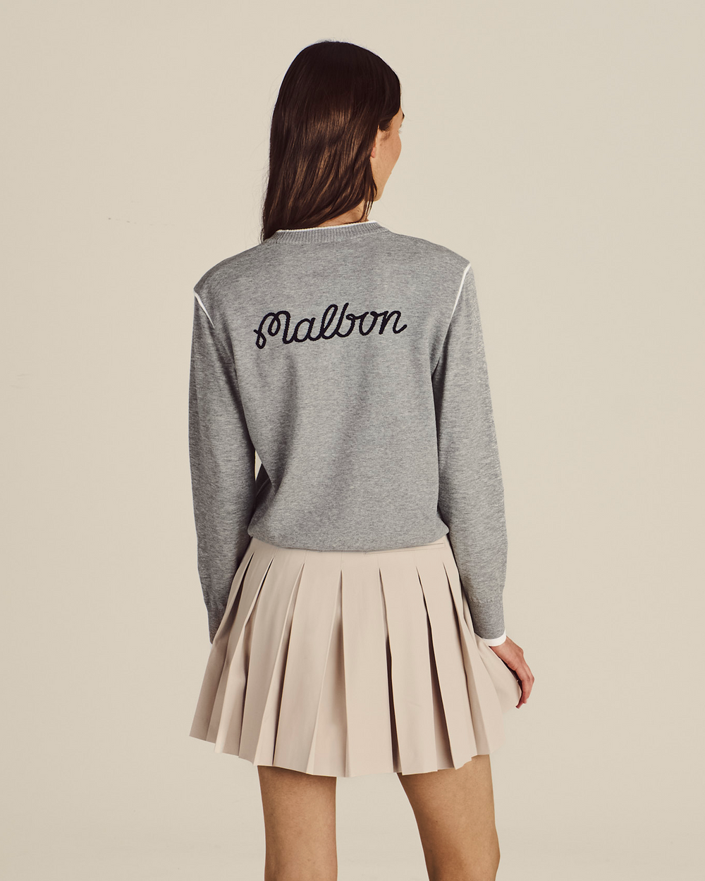 STUDIO SEOUL HIGH-LOW PLEATED SKIRT