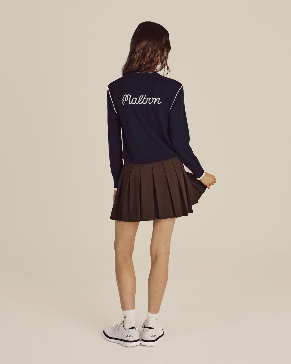 STUDIO SEOUL HIGH-LOW PLEATED SKIRT