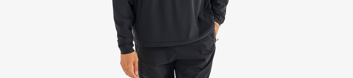 PERFORMANCE QUARTER ZIP SHELL PULLOVER