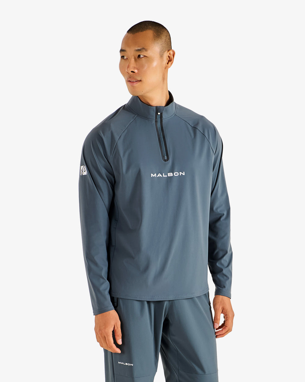 PERFORMANCE RAGLAN QUARTER ZIP